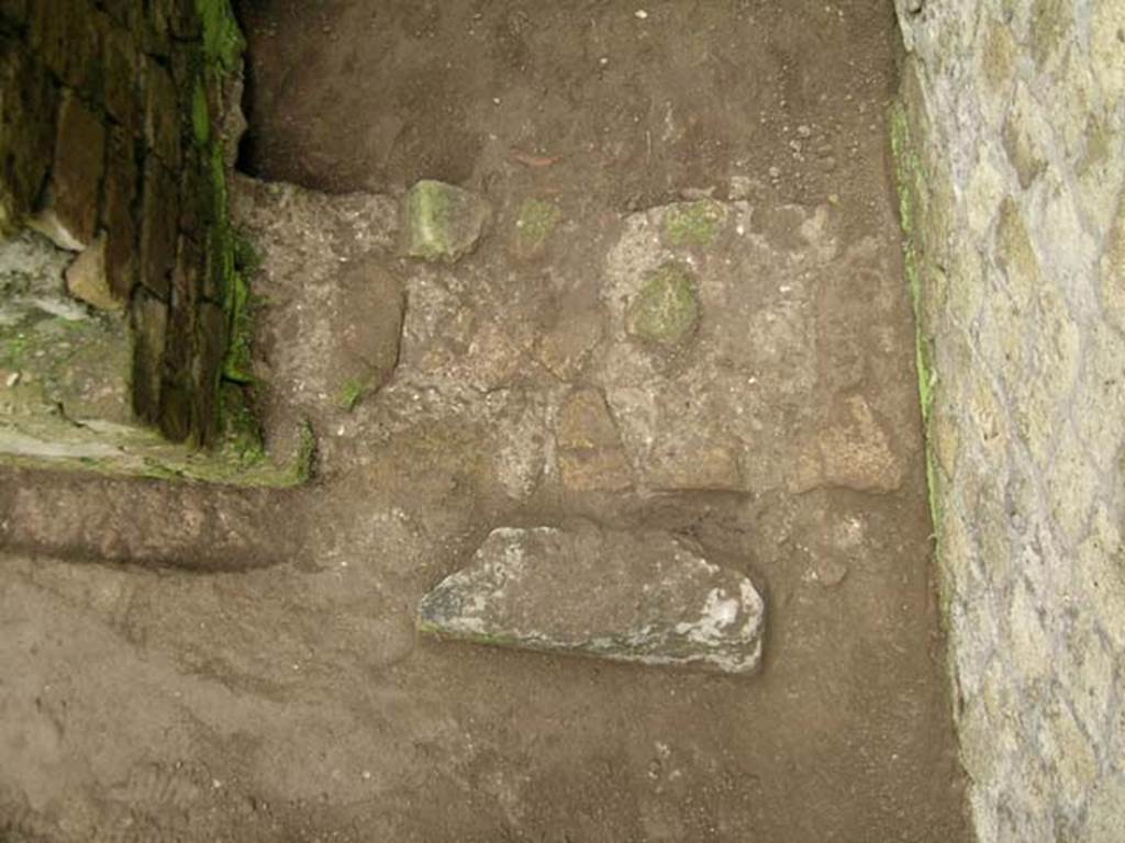 Ins Or II, 7/8, Herculaneum.December 2004. Looking west towards threshold of room on the south side of the mill-room of Ins. Or. II.8.
Photo courtesy of Nicolas Monteix.